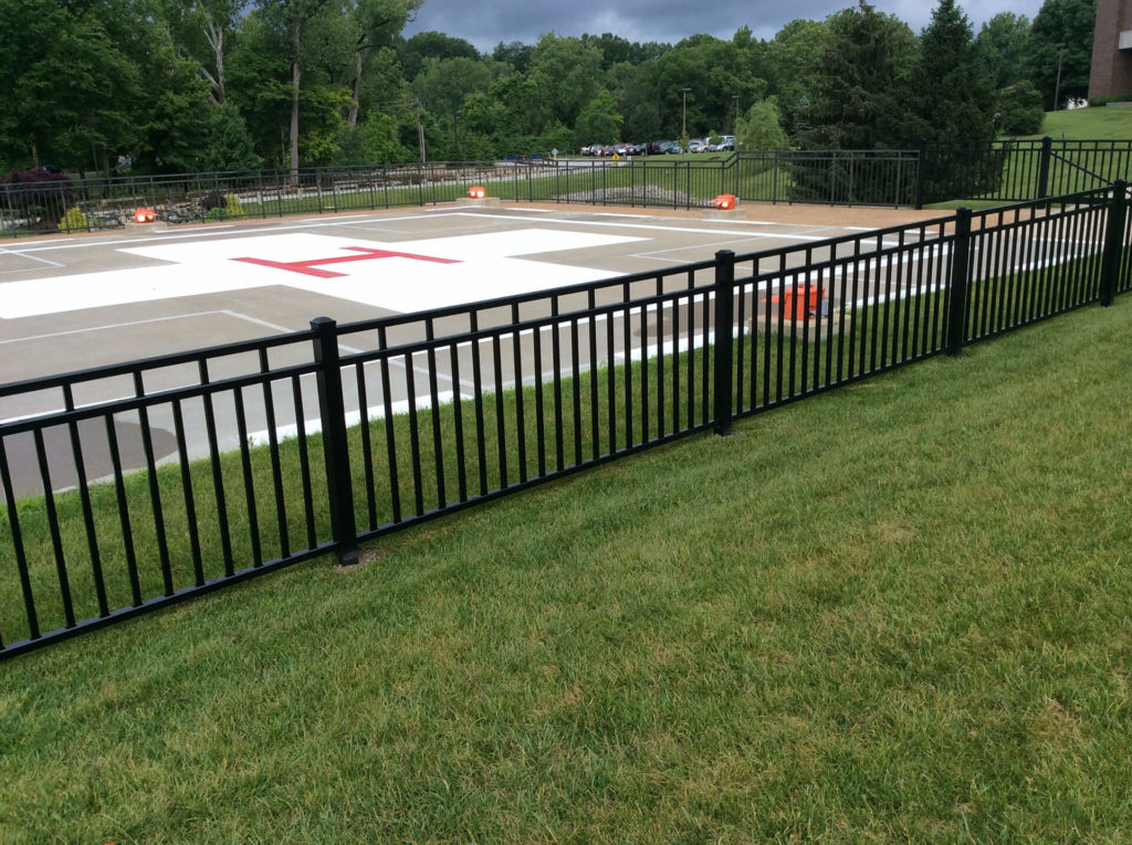 aluminum fence surrounding a helipad