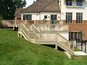 Deck and Fence Company Warson Woods MO wood staircase leading to elevated deck